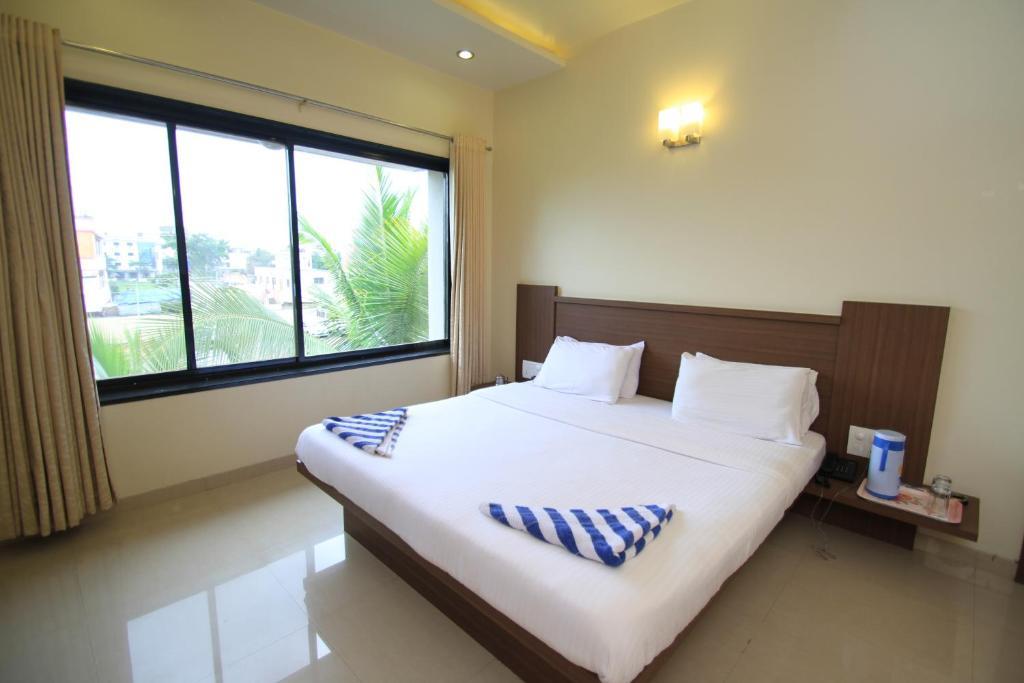 Hotel Sai Smaran Shirdi Chambre photo